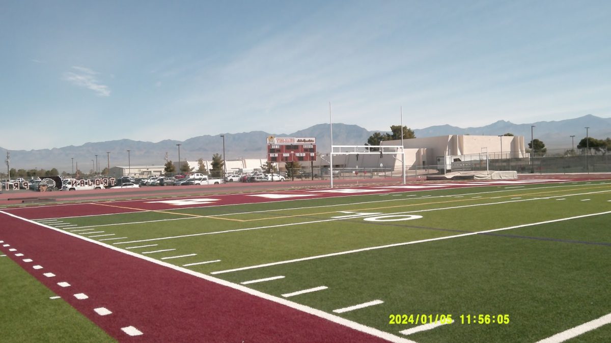 The football field with the scoreboard